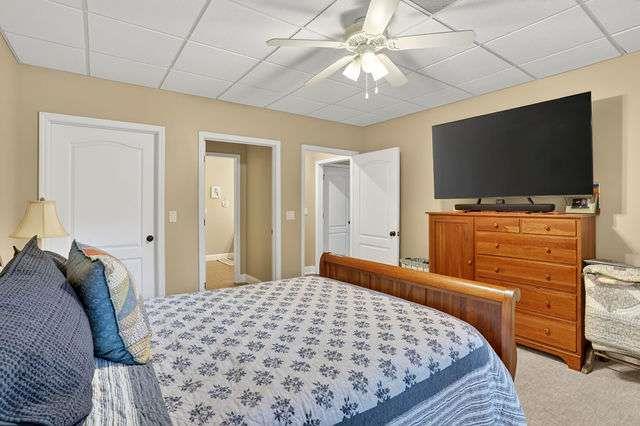 8179 Pineview Court Villa Rica, GA 30180 - Photo 22 of 41 a bedroom with a bed and a flat screen tv