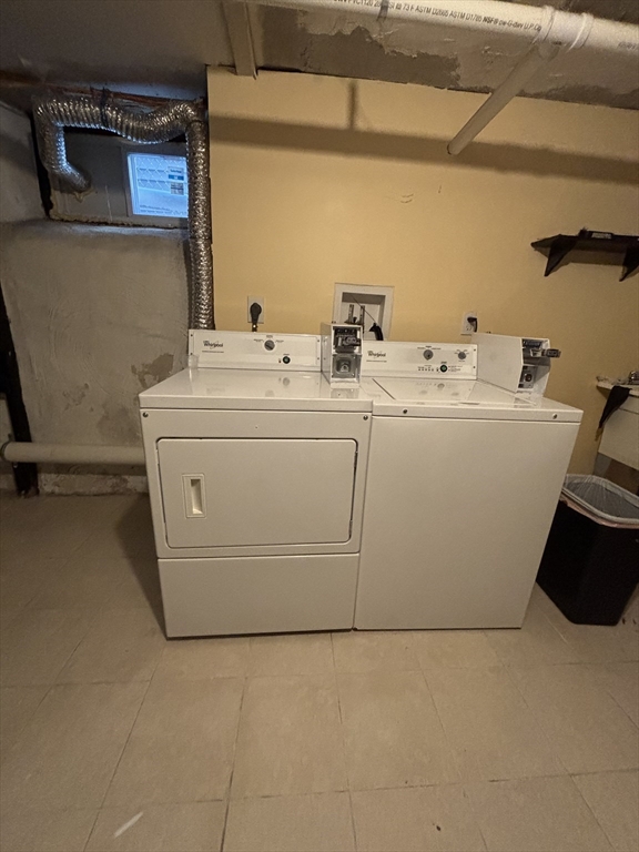 11 Raven Street, Unit 2 Boston, MA 02125 - Photo 10 of 10 a utility room with dryer and washer
