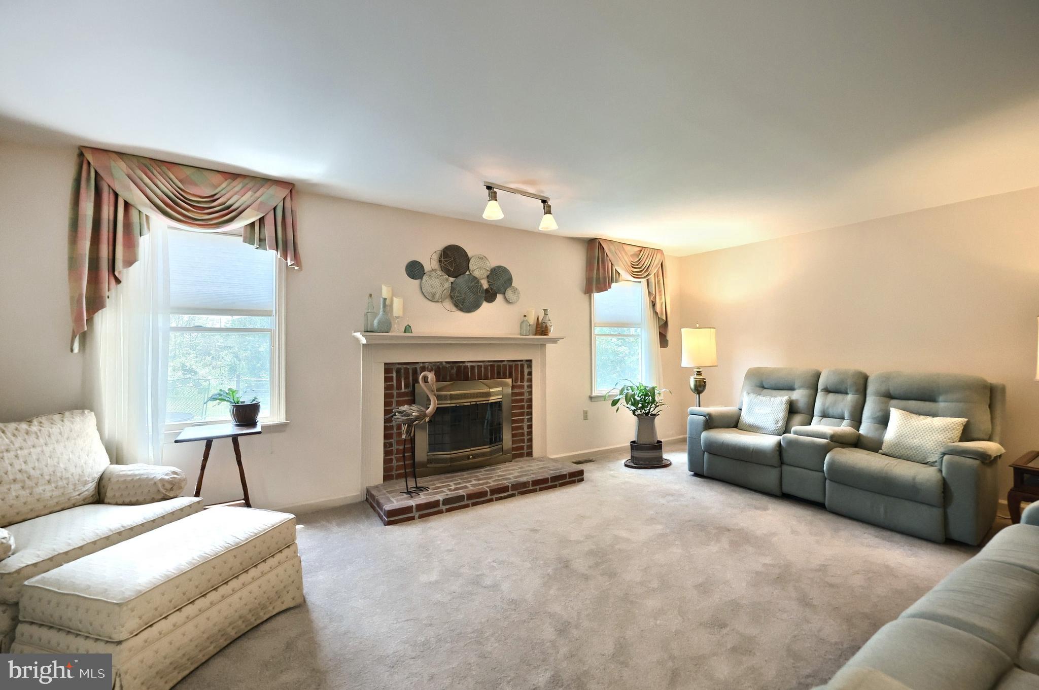 355 Sachs Road Gettysburg, PA 17325 - Photo 8 of 49 a living room with furniture and a fireplace