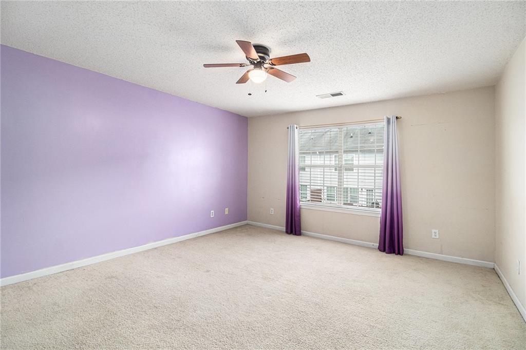 3262 Cascade Parc Boulevard Southwest Atlanta, GA 30311 - Photo 12 of 24 a view of an empty room with a window