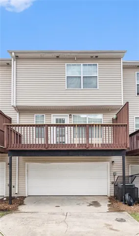 a front view of a house with glass windows