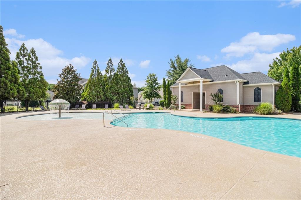 3262 Cascade Parc Boulevard Southwest Atlanta, GA 30311 - Photo 24 of 24 a view of house with swimming pool and yard