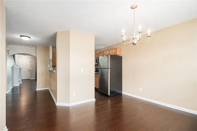 a view of a livingroom with wooden floor
