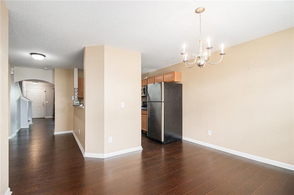 3262 Cascade Parc Boulevard Southwest Atlanta, GA 30311 - Photo 9 of 24 a view of a livingroom with wooden floor
