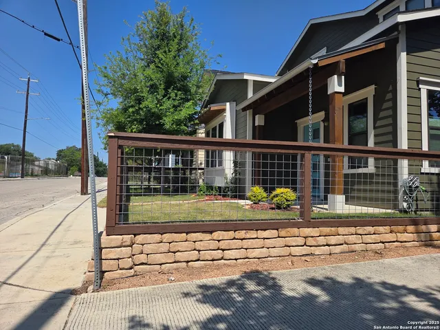 a view of swimming pool with sitting area