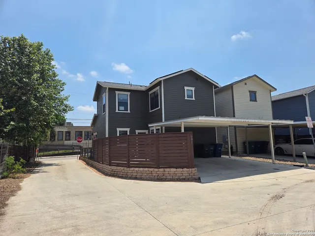 a front view of a house with a garage