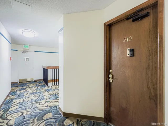 a view of a hallway with a bedroom