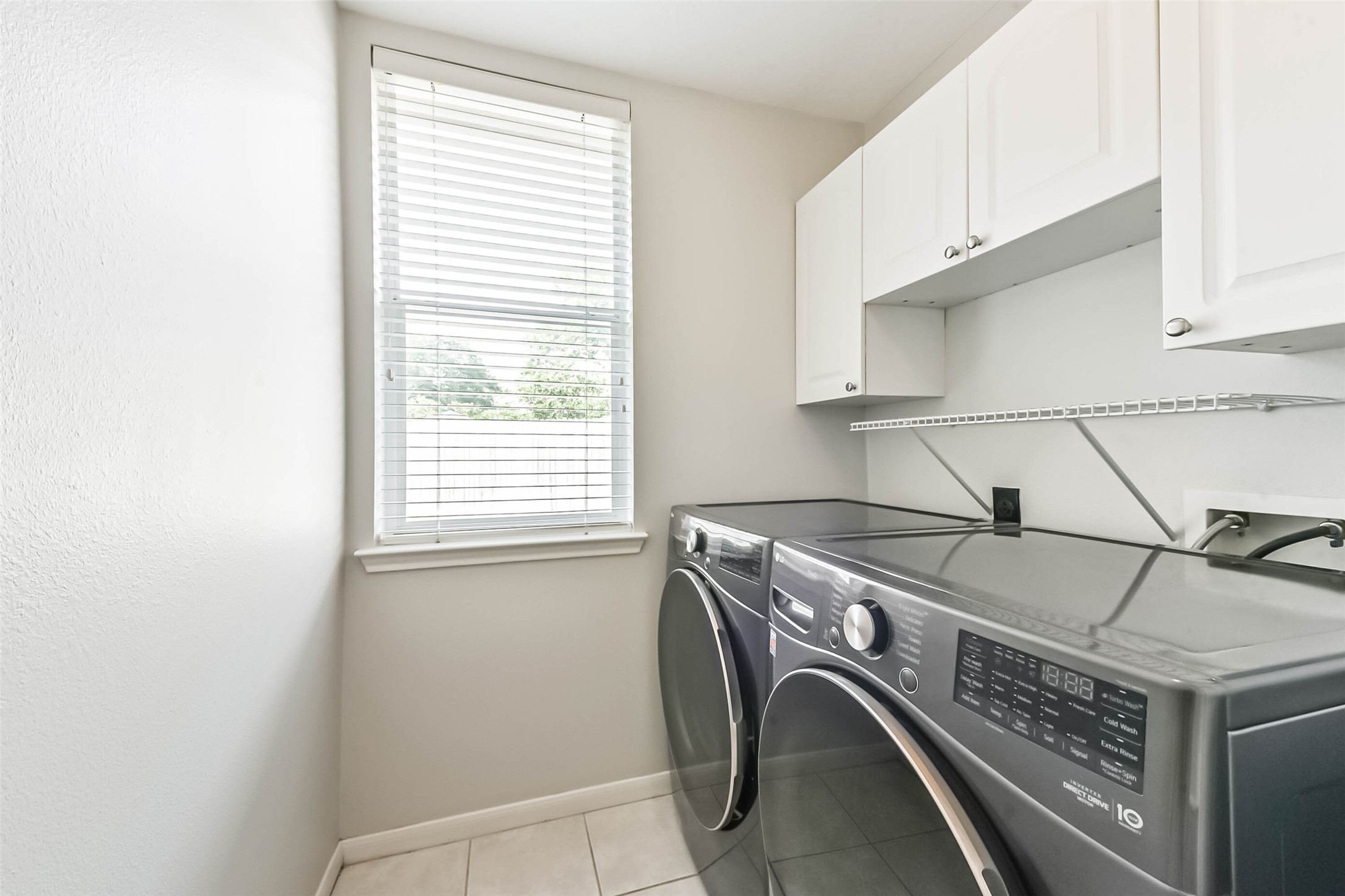 14610 Farrawood Drive Cypress, TX 77429 - Photo 13 of 35 Laundry w/ washer/dryer and extra refrigerator