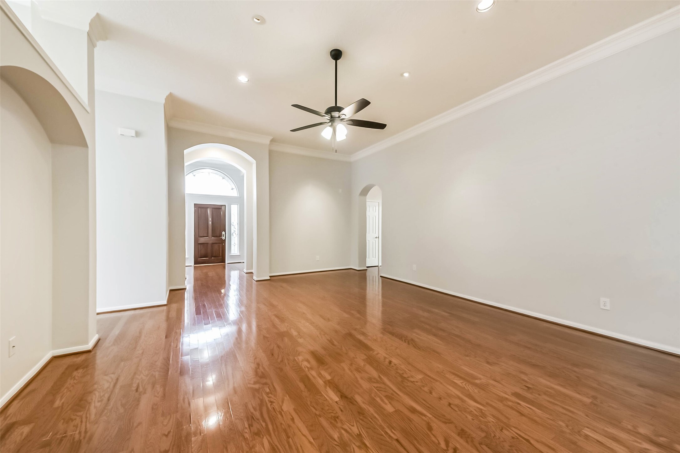 14610 Farrawood Drive Cypress, TX 77429 - Photo 14 of 35 a view of empty room with wooden floor