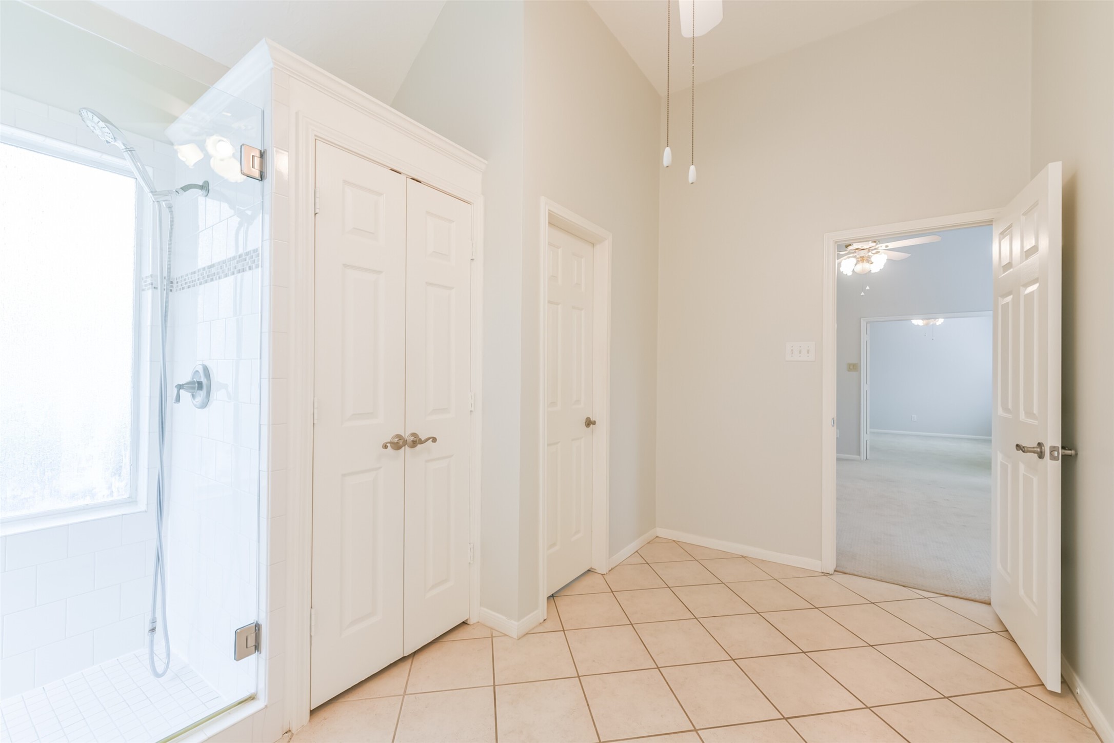 14610 Farrawood Drive Cypress, TX 77429 - Photo 27 of 35 a bathroom with a shower and a glass door