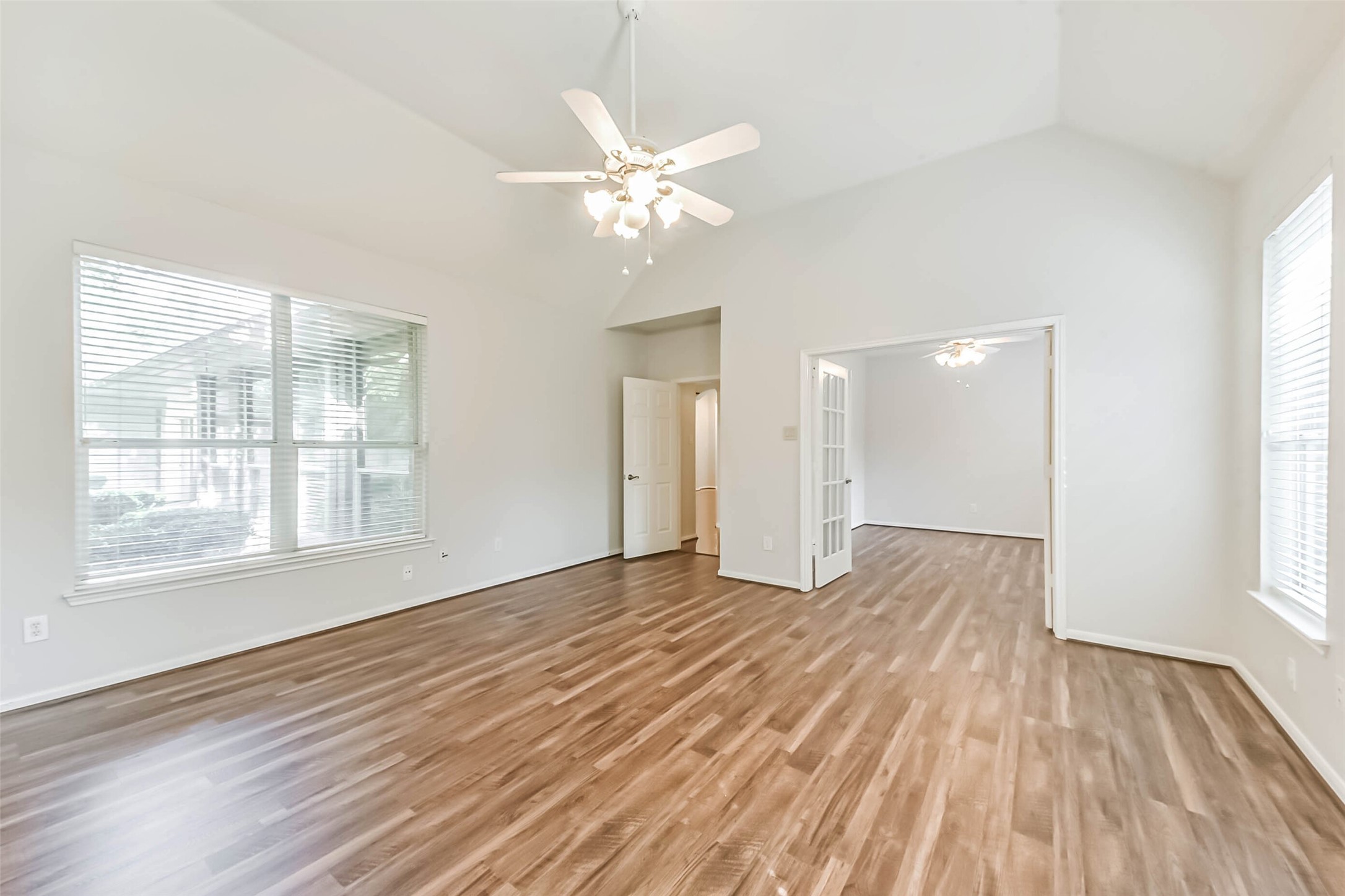 14610 Farrawood Drive Cypress, TX 77429 - Photo 28 of 35 a view of an empty room with wooden floor and a window