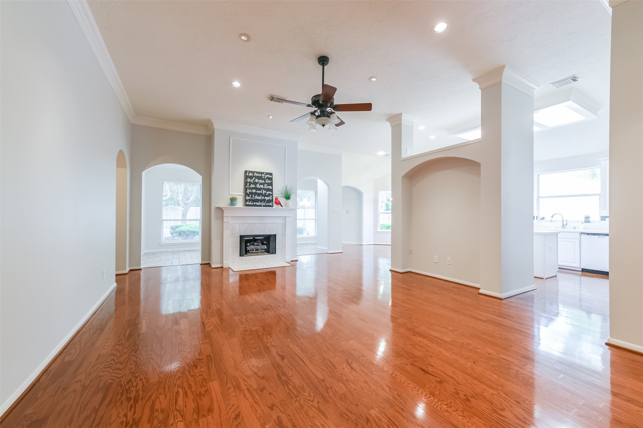 14610 Farrawood Drive Cypress, TX 77429 - Photo 4 of 35 a view of empty room with wooden floor and ceiling fan