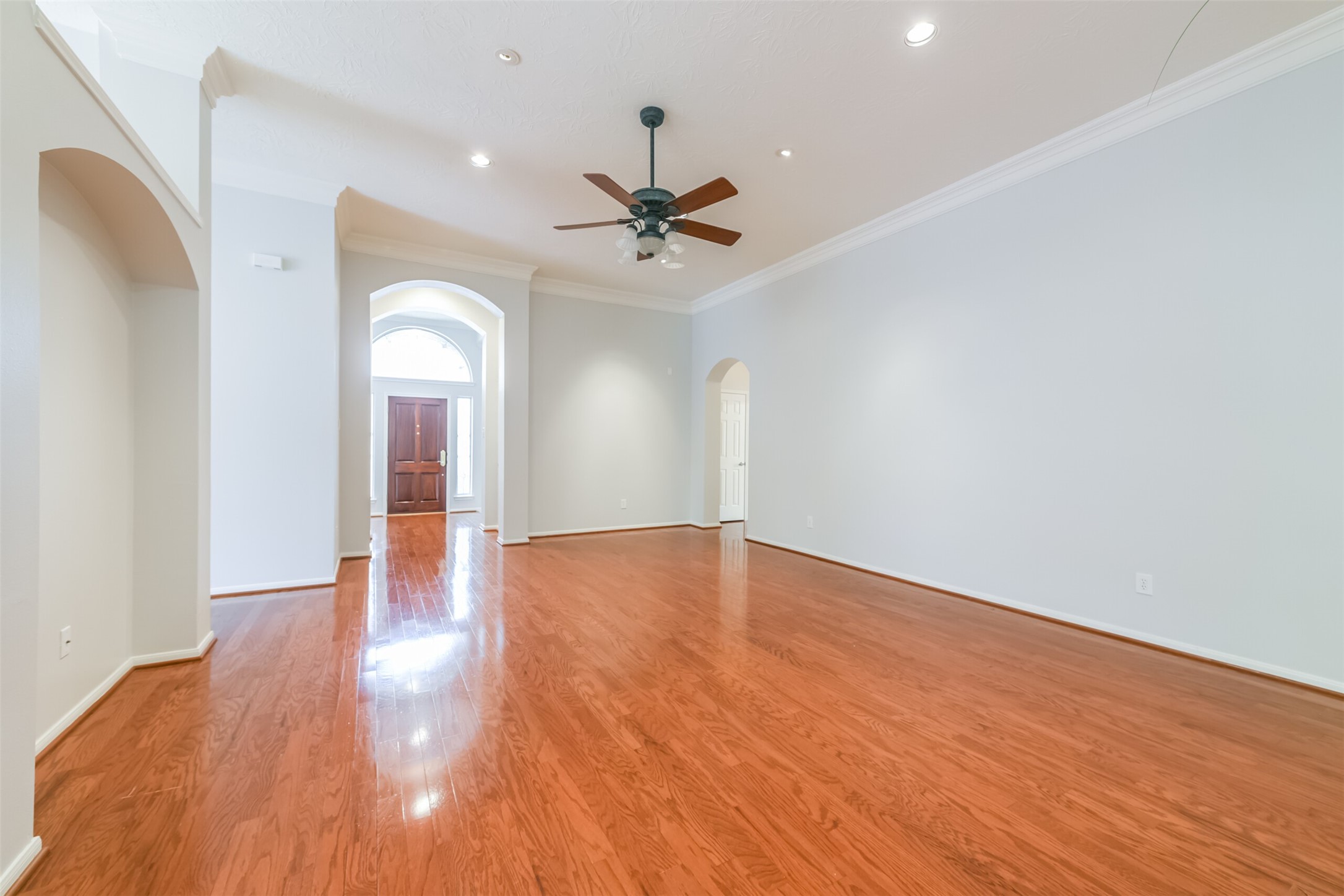 14610 Farrawood Drive Cypress, TX 77429 - Photo 6 of 35 wooden floor in an empty room with a window