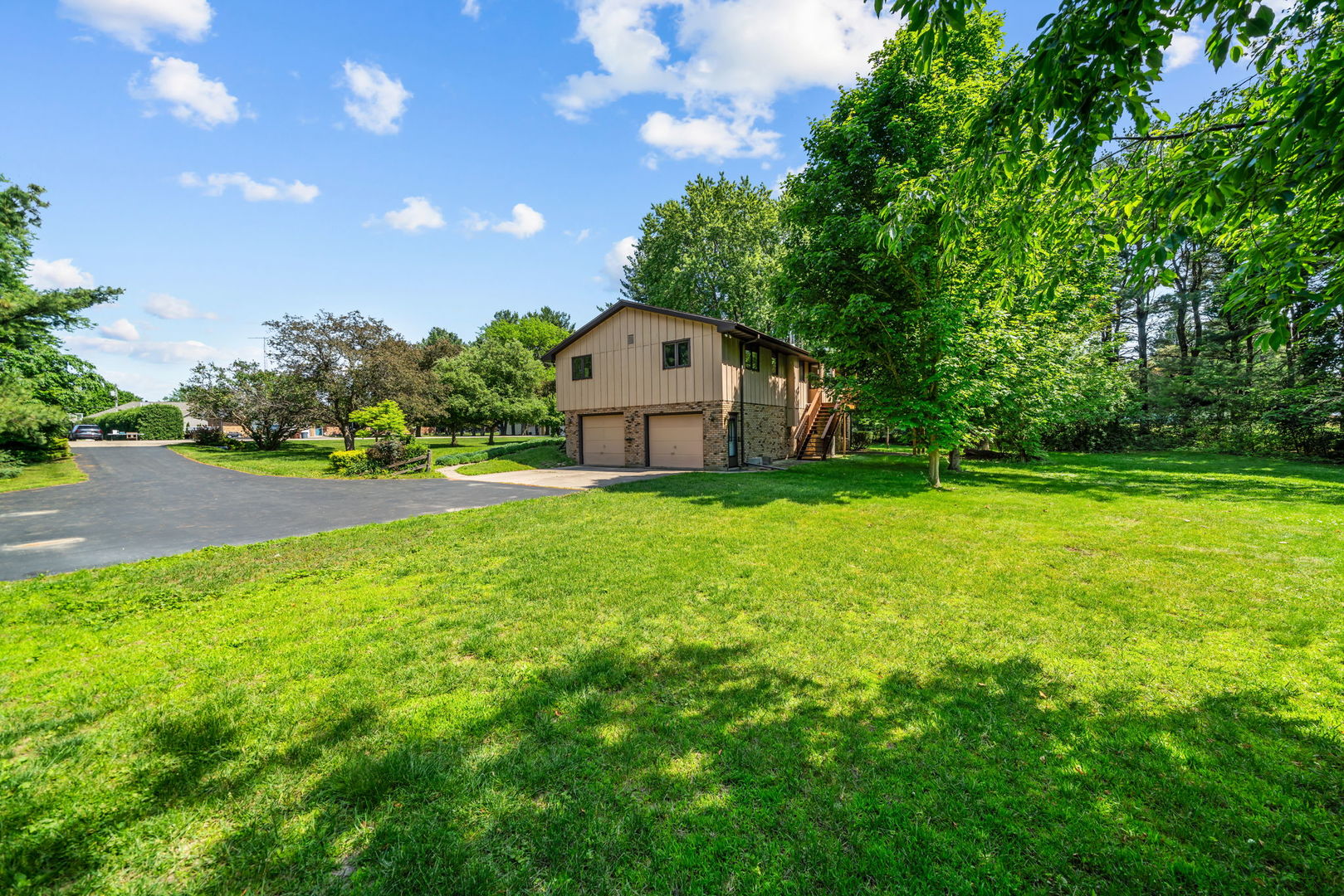 5748 South Skare Road Rochelle, IL 61068 - Photo 38 of 45 a house is sitting in middle od the grass
