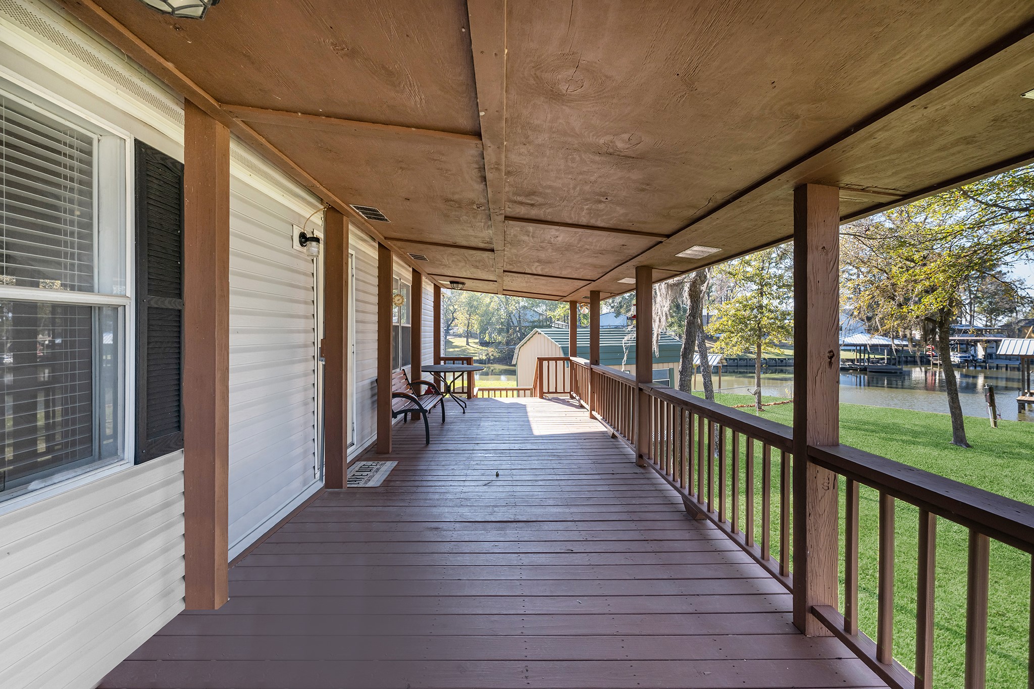 450 Ridge Trail Trinity, TX 75862 - Photo 24 of 30 a view of a porch with wooden floor