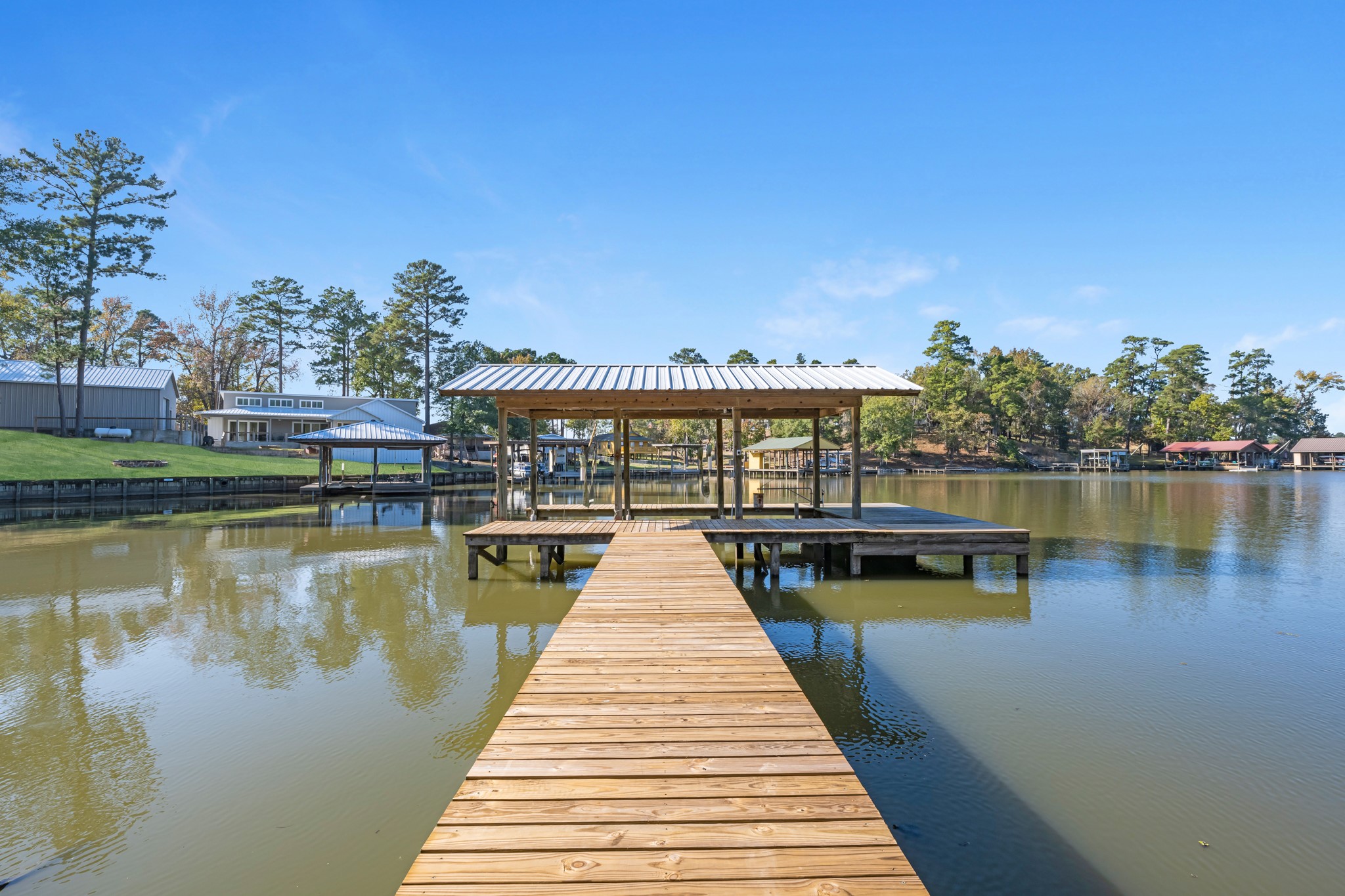 450 Ridge Trail Trinity, TX 75862 - Photo 28 of 30 a view of a lake with a large trees