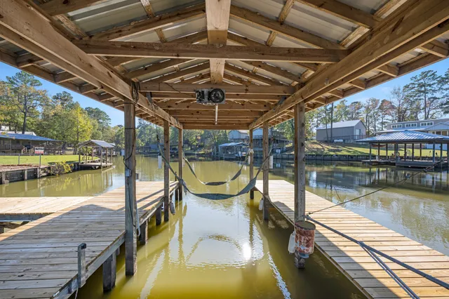 a view of a swimming pool with a lake view
