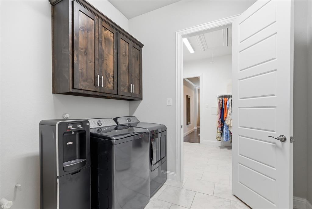 8713 Homestead Boulevard Rowlett, TX 75089 - Photo 15 of 28 a utility room with closet