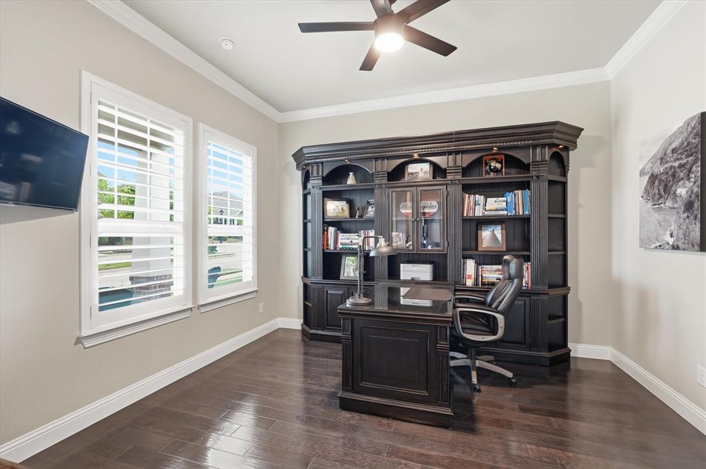 8713 Homestead Boulevard Rowlett, TX 75089 - Photo 16 of 28 a view of a workspace with furniture and a window