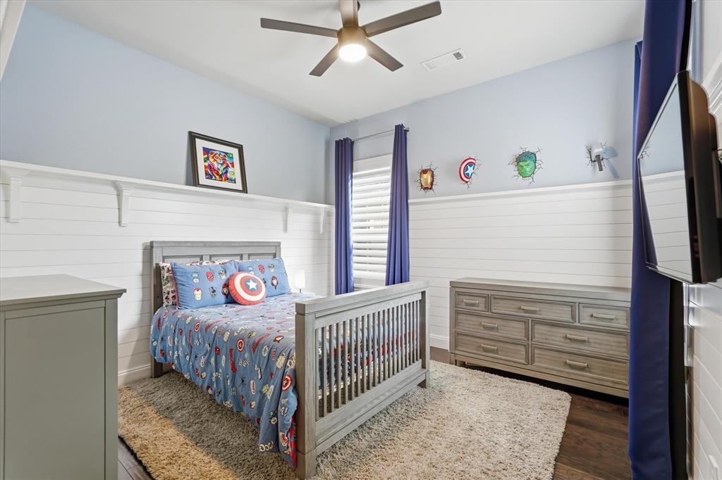 8713 Homestead Boulevard Rowlett, TX 75089 - Photo 20 of 28 a bedroom with a bed and a window