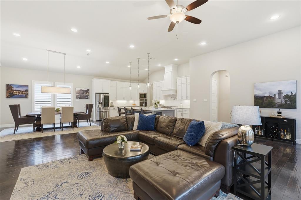 8713 Homestead Boulevard Rowlett, TX 75089 - Photo 9 of 28 a living room with furniture and a view of kitchen