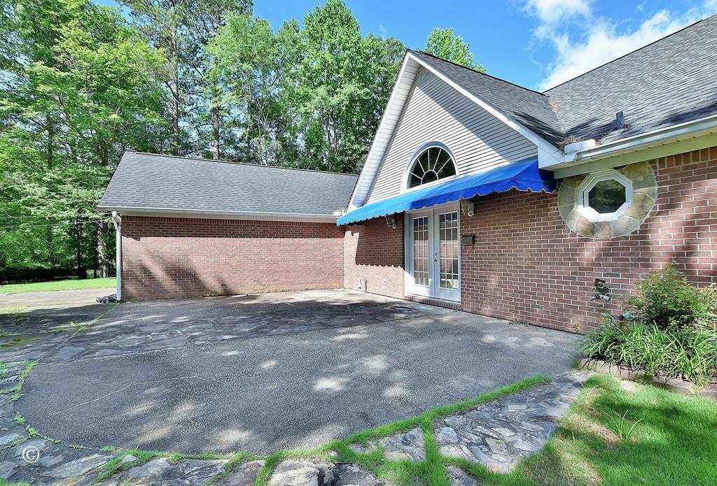 529 Apache Trail Waverly Hall, GA 31831 - Photo 8 of 29 garage and back