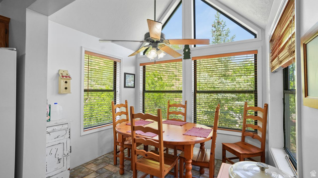 335 Jungfrau Hill Road Midway, UT 84049 - Photo 21 of 34 Dining room featuring a ceiling fan and stone finish floors