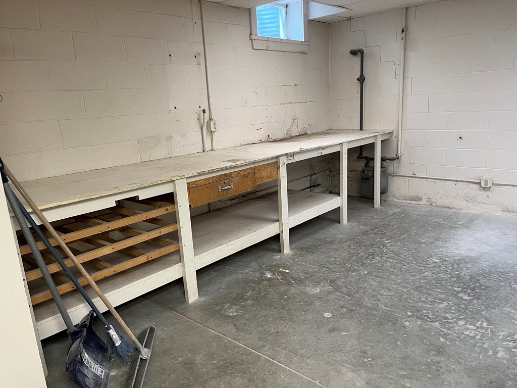 823 West Spring Street Titusville, PA 16354 - Photo 37 of 43 a view of an empty room with empty racks