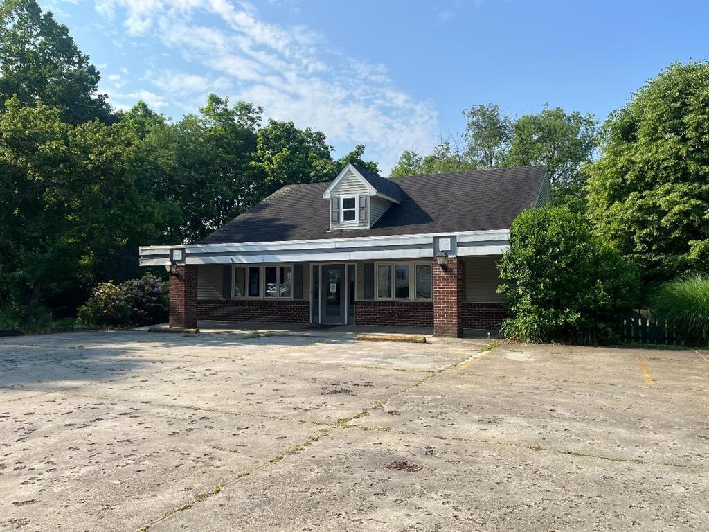 823 West Spring Street Titusville, PA 16354 - Photo 6 of 43 a house with trees in the background
