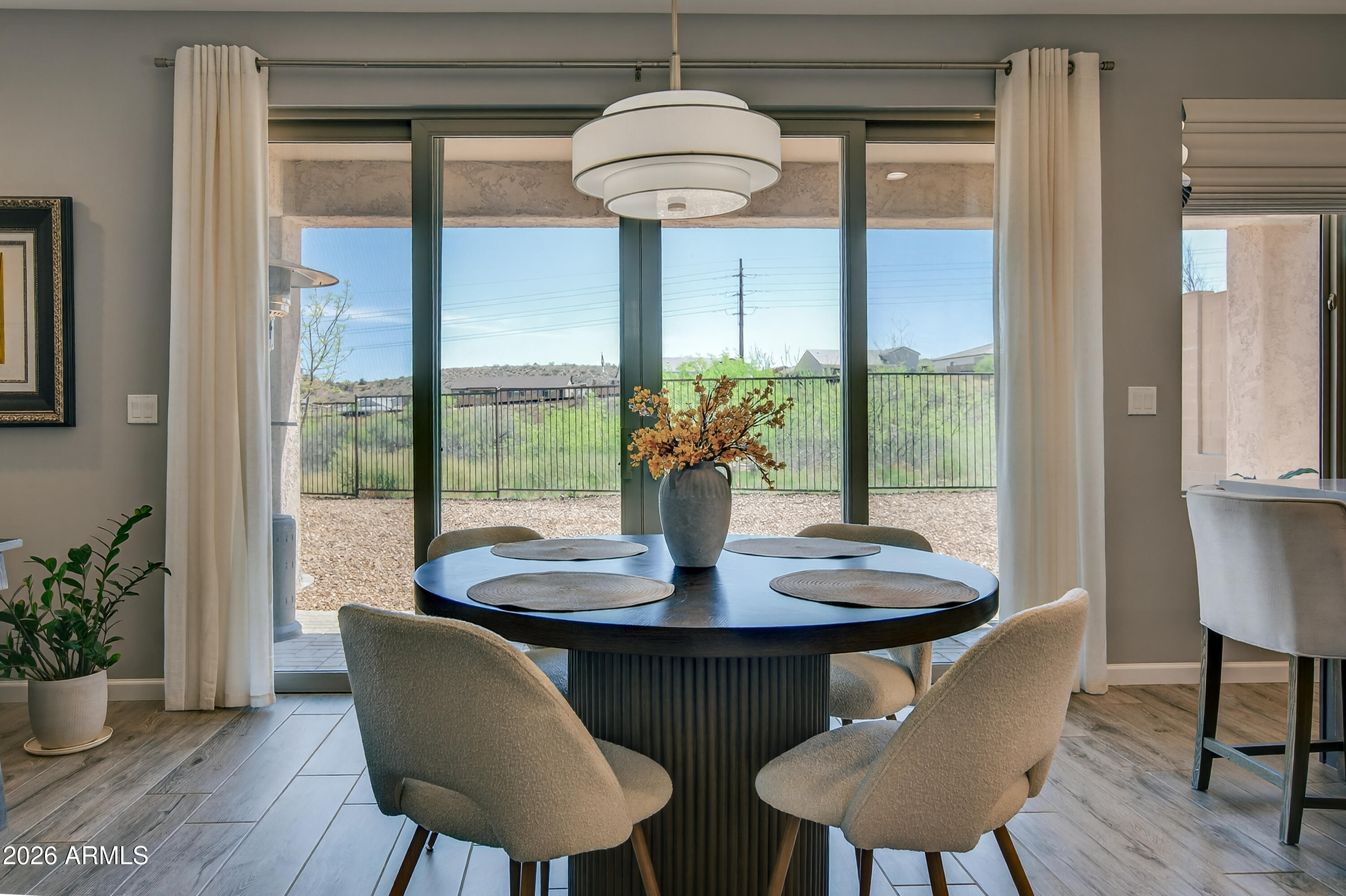 495 Cleopatra Hill Road Clarkdale, AZ 86324 - Photo 12 of 33 a dining room with furniture and wooden floor