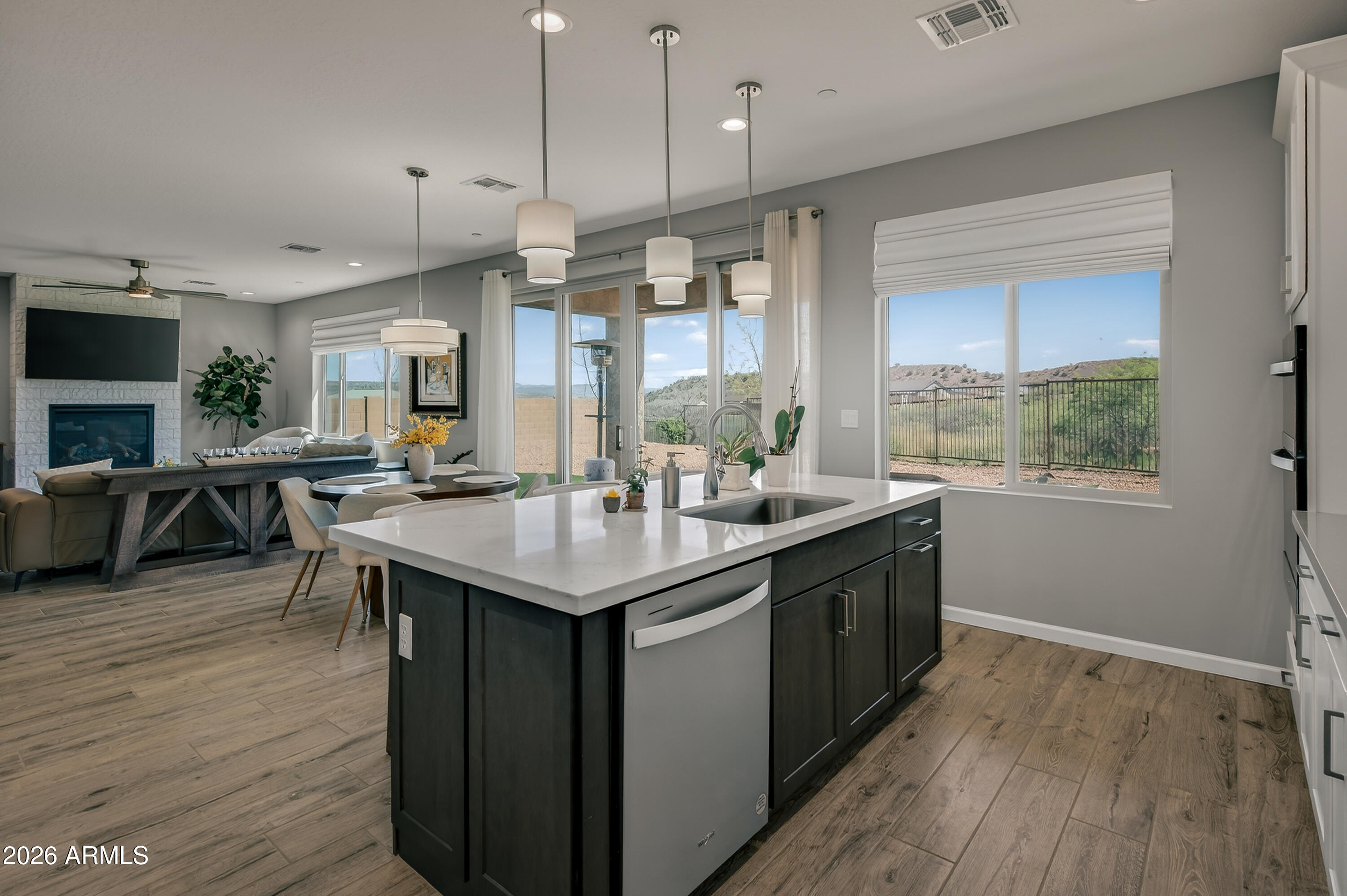 495 Cleopatra Hill Road Clarkdale, AZ 86324 - Photo 15 of 33 a kitchen with counter top space a sink appliances and cabinets