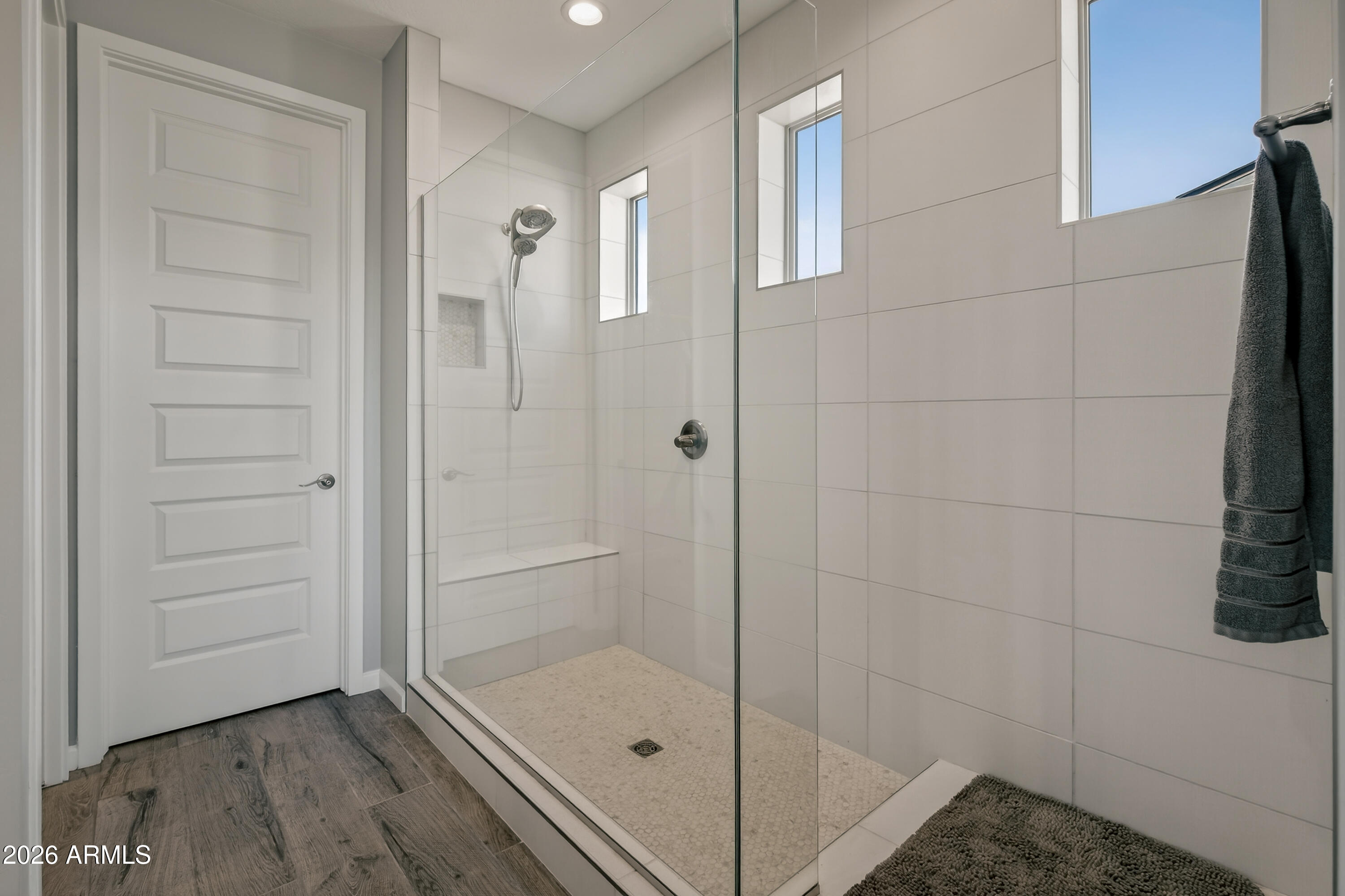 495 Cleopatra Hill Road Clarkdale, AZ 86324 - Photo 17 of 33 a bathroom with a glass shower door