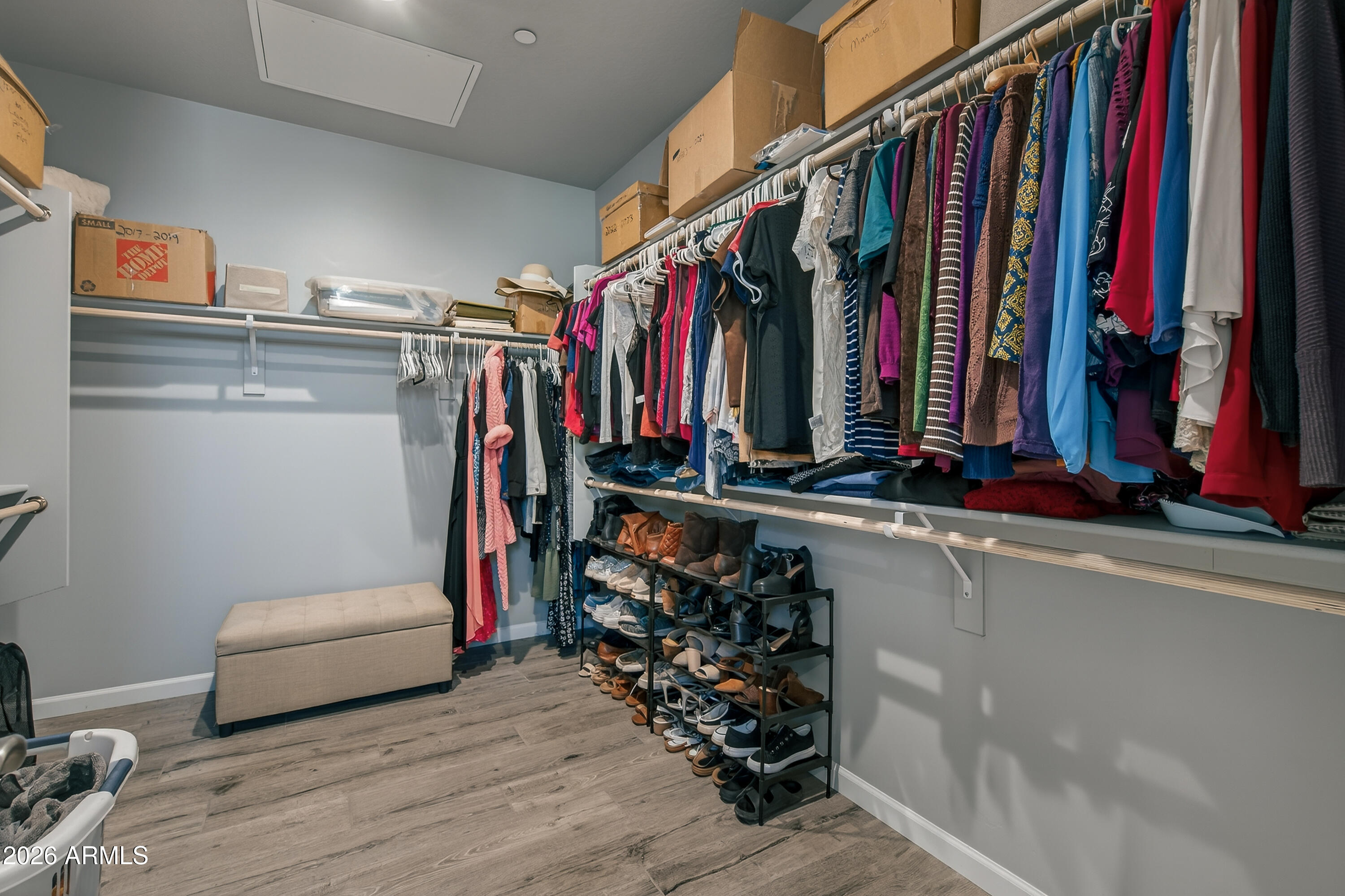 495 Cleopatra Hill Road Clarkdale, AZ 86324 - Photo 19 of 33 a view of walk in closet with clothes and shoes