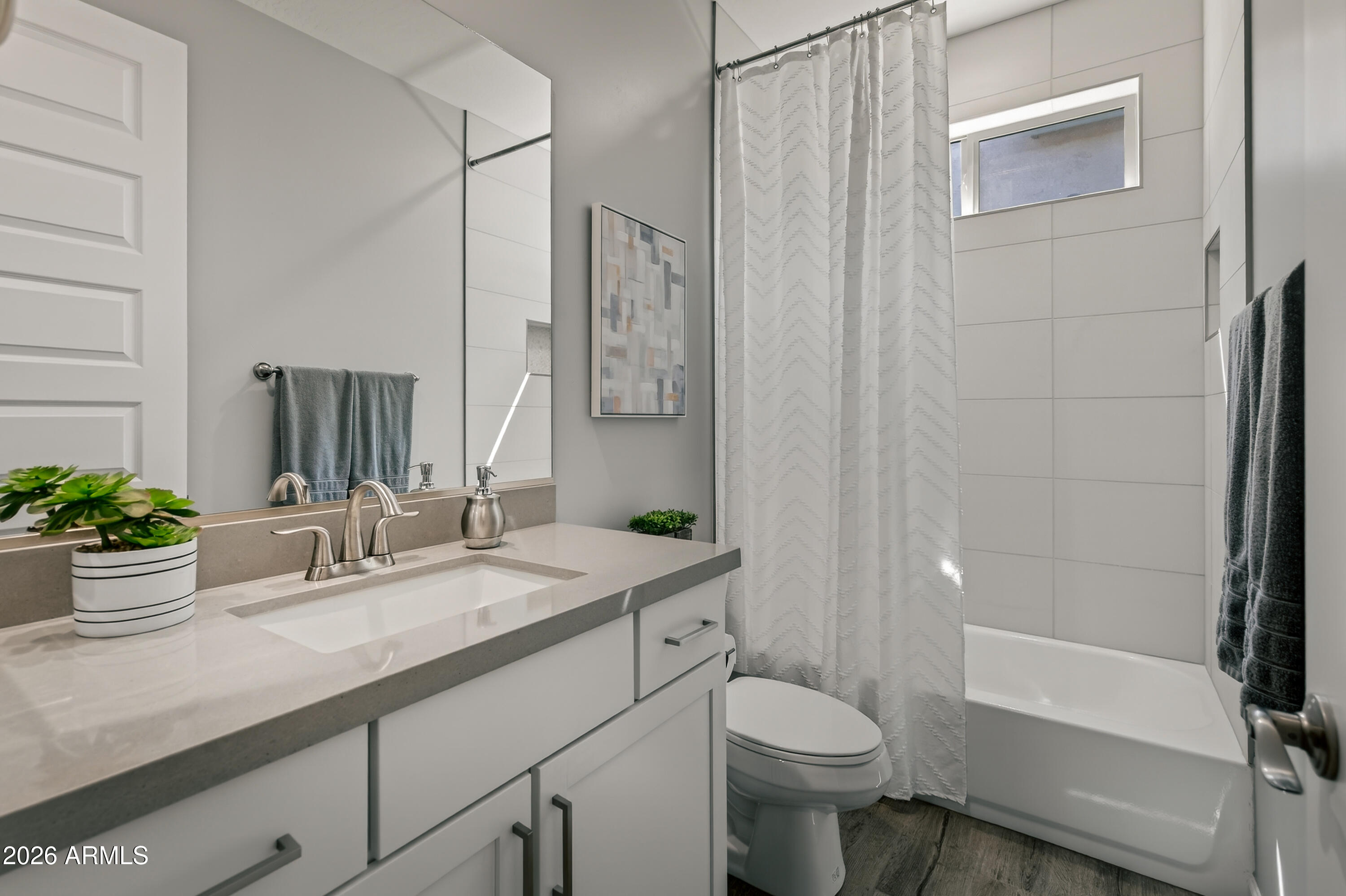 495 Cleopatra Hill Road Clarkdale, AZ 86324 - Photo 22 of 33 a bathroom with a sink a toilet and shower