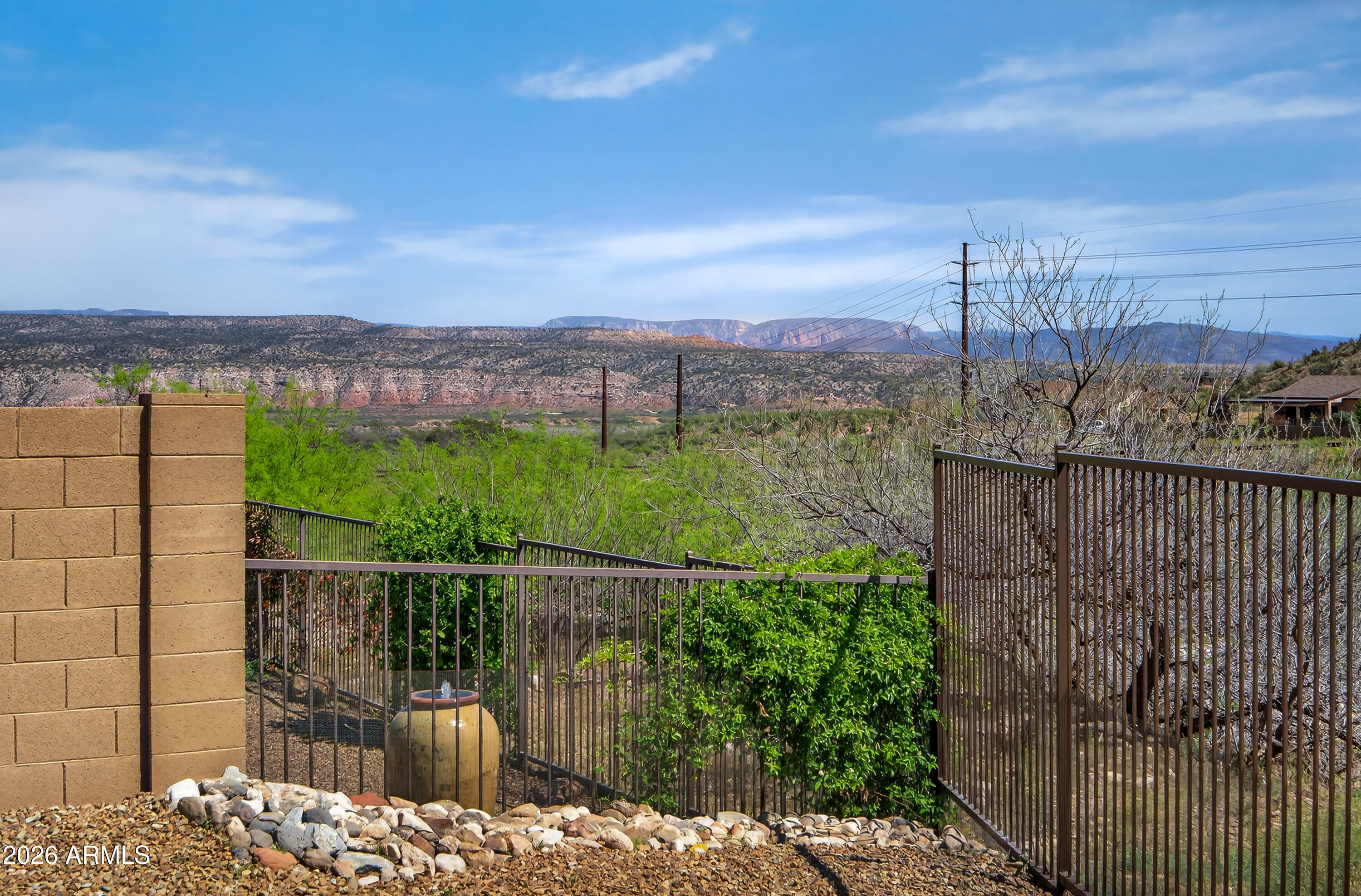 495 Cleopatra Hill Road Clarkdale, AZ 86324 - Photo 5 of 33 a view of a balcony with a forest