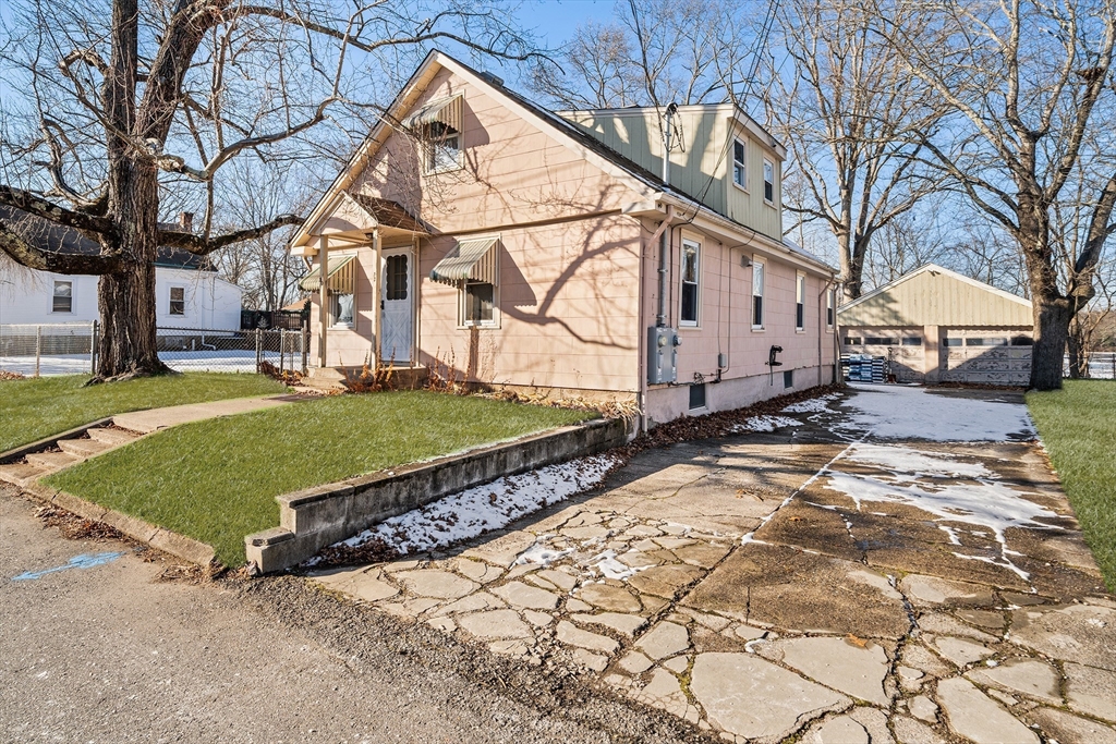 90 Ellis Street Seekonk, MA 02771 - Photo 2 of 12 a view of a backyard with a garden