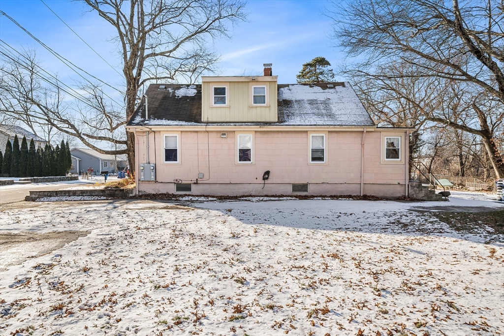 90 Ellis Street Seekonk, MA 02771 - Photo 8 of 12 a view of a house with a snow
