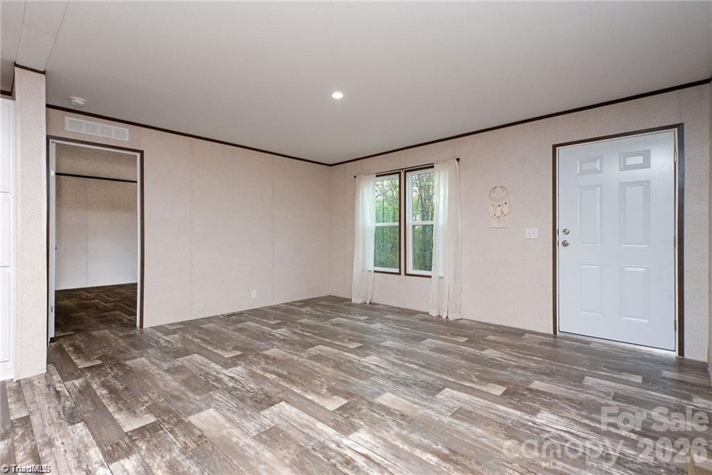2013 Carl Fox Road Taylorsville, NC 28681 - Photo 11 of 22 a view of an empty room and window