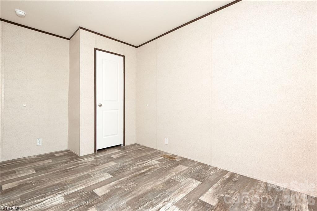 2013 Carl Fox Road Taylorsville, NC 28681 - Photo 20 of 22 a view of a small space with wooden floor