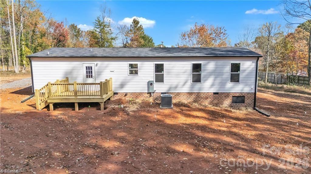 2013 Carl Fox Road Taylorsville, NC 28681 - Photo 22 of 22 a view of a house with a patio