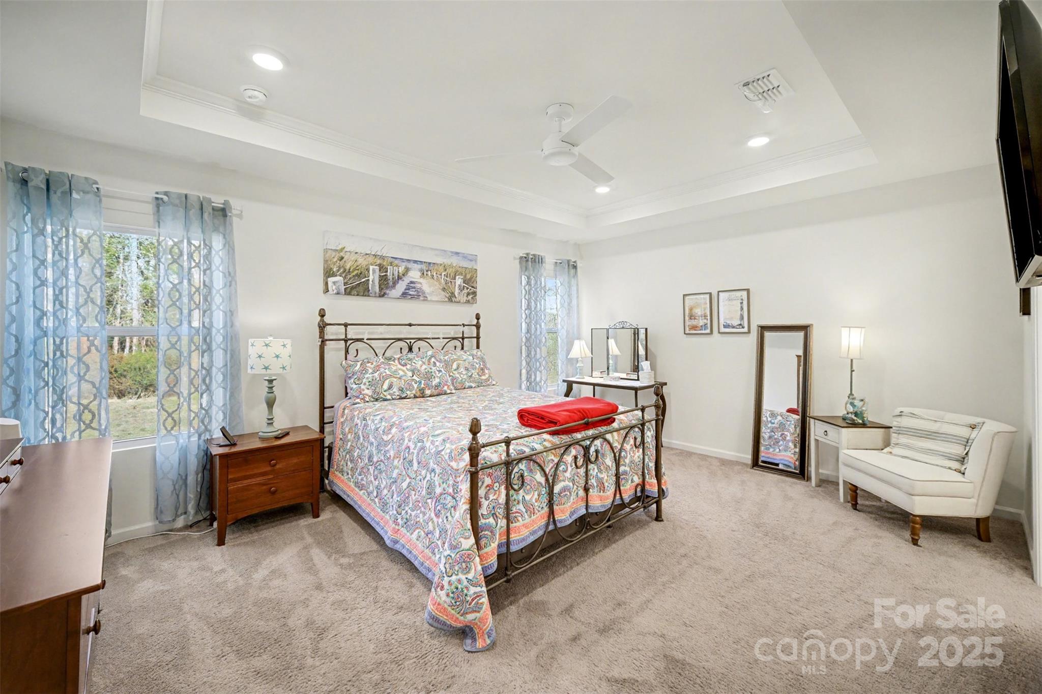 226 Quinn Road Matthews, NC 28104 - Photo 18 of 30 a bedroom with a bed and a view of bedroom