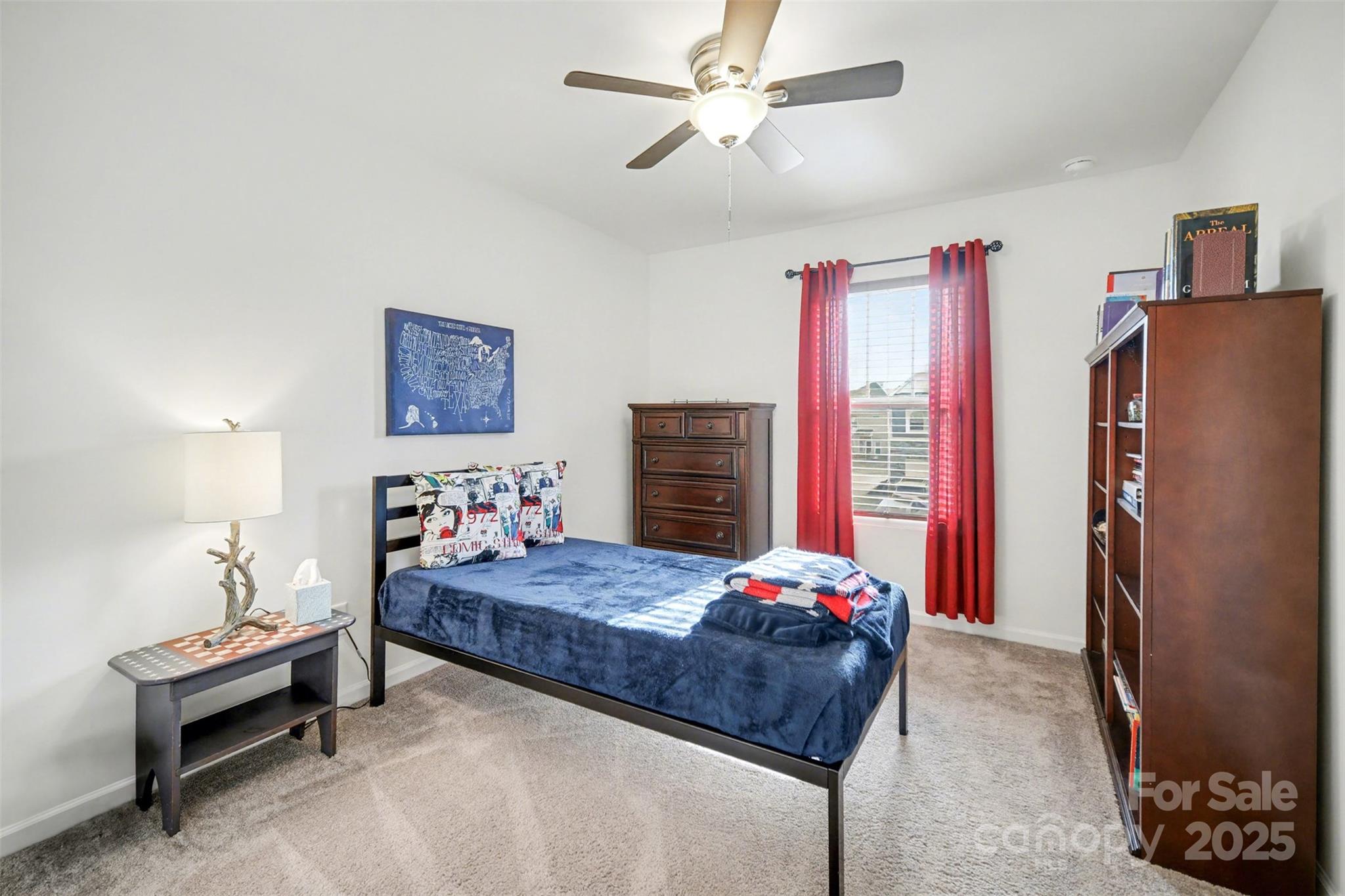 226 Quinn Road Matthews, NC 28104 - Photo 24 of 30 a bedroom with a bed dresser and a window