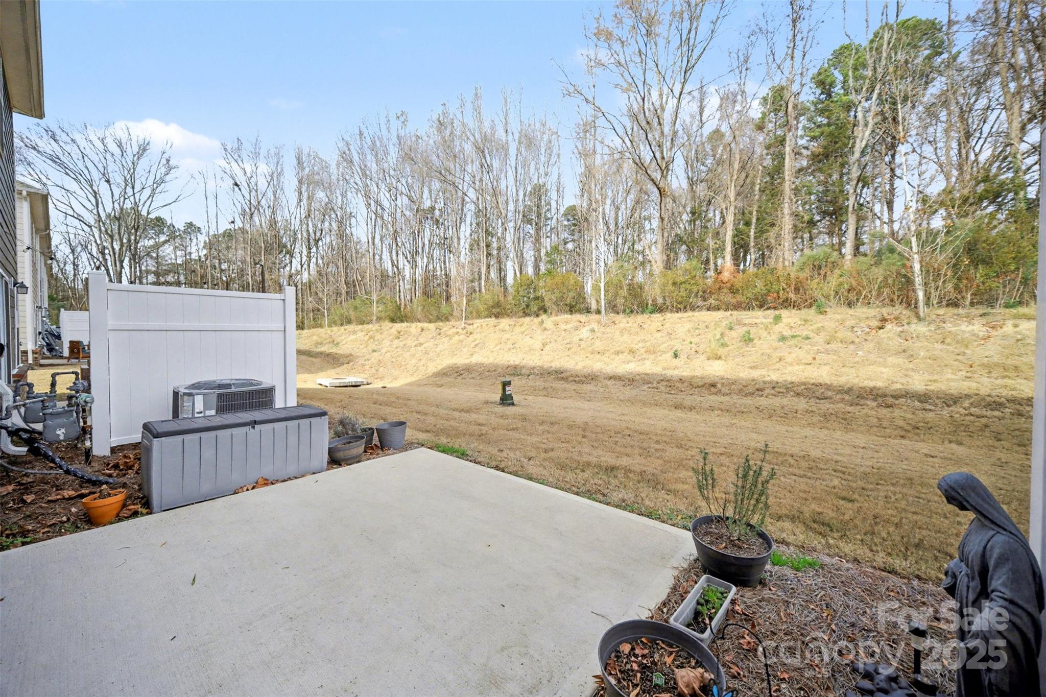 226 Quinn Road Matthews, NC 28104 - Photo 27 of 30 a view of a yard with an outdoor space