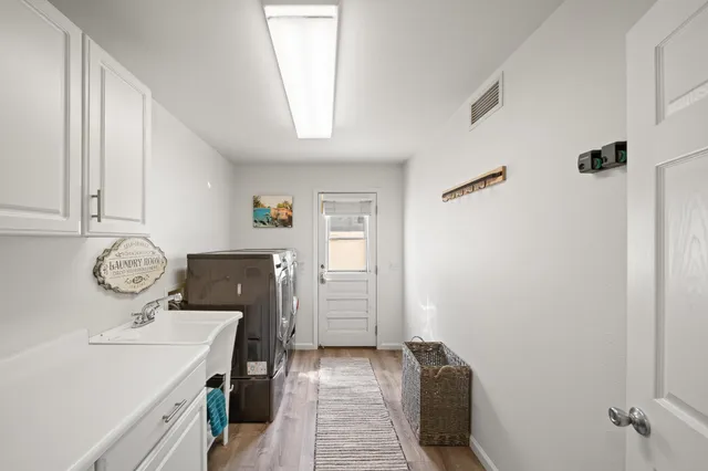 an aerial view of a house with a garden