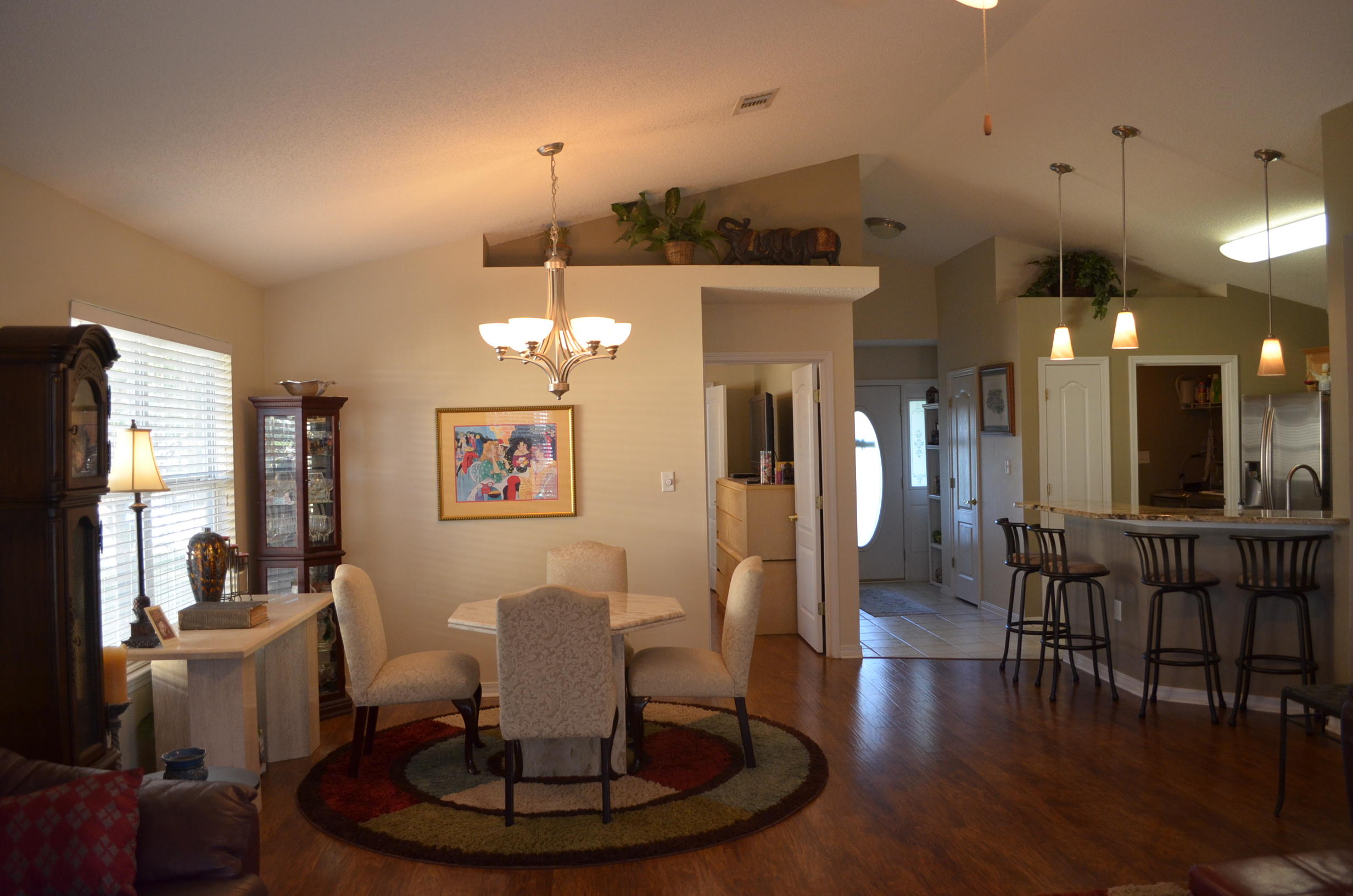 669 East Shipwreck Road Santa Rosa Beach, FL 32459 - Photo 2 of 35 a living room with furniture a window and kitchen view