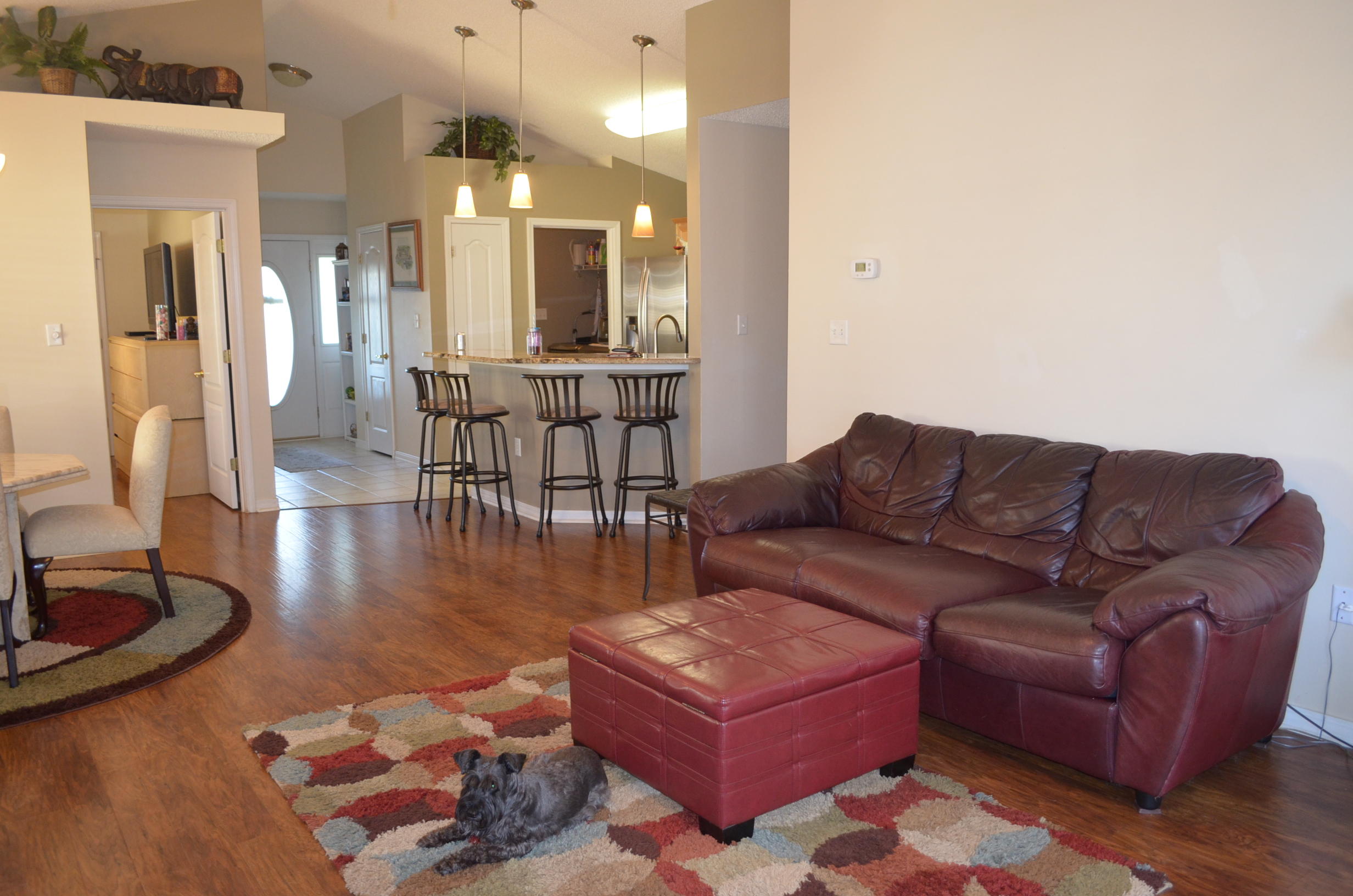 669 East Shipwreck Road Santa Rosa Beach, FL 32459 - Photo 33 of 35 a living room with furniture wooden floor and a large window
