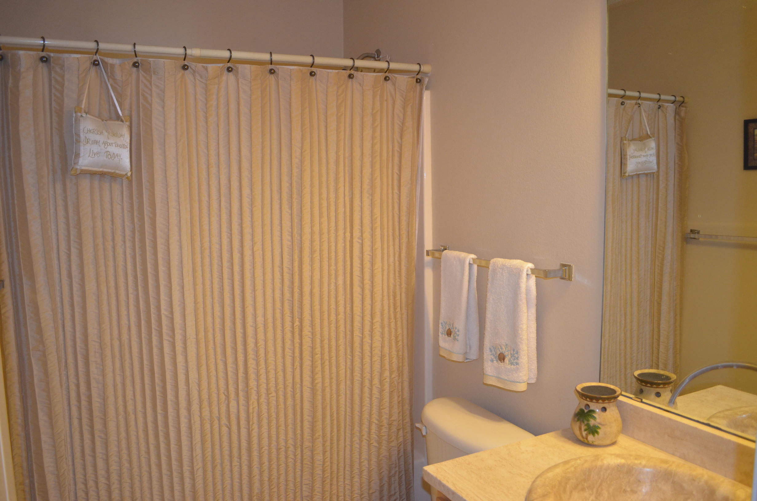 669 East Shipwreck Road Santa Rosa Beach, FL 32459 - Photo 18 of 35 a bathroom with a sink and a mirror