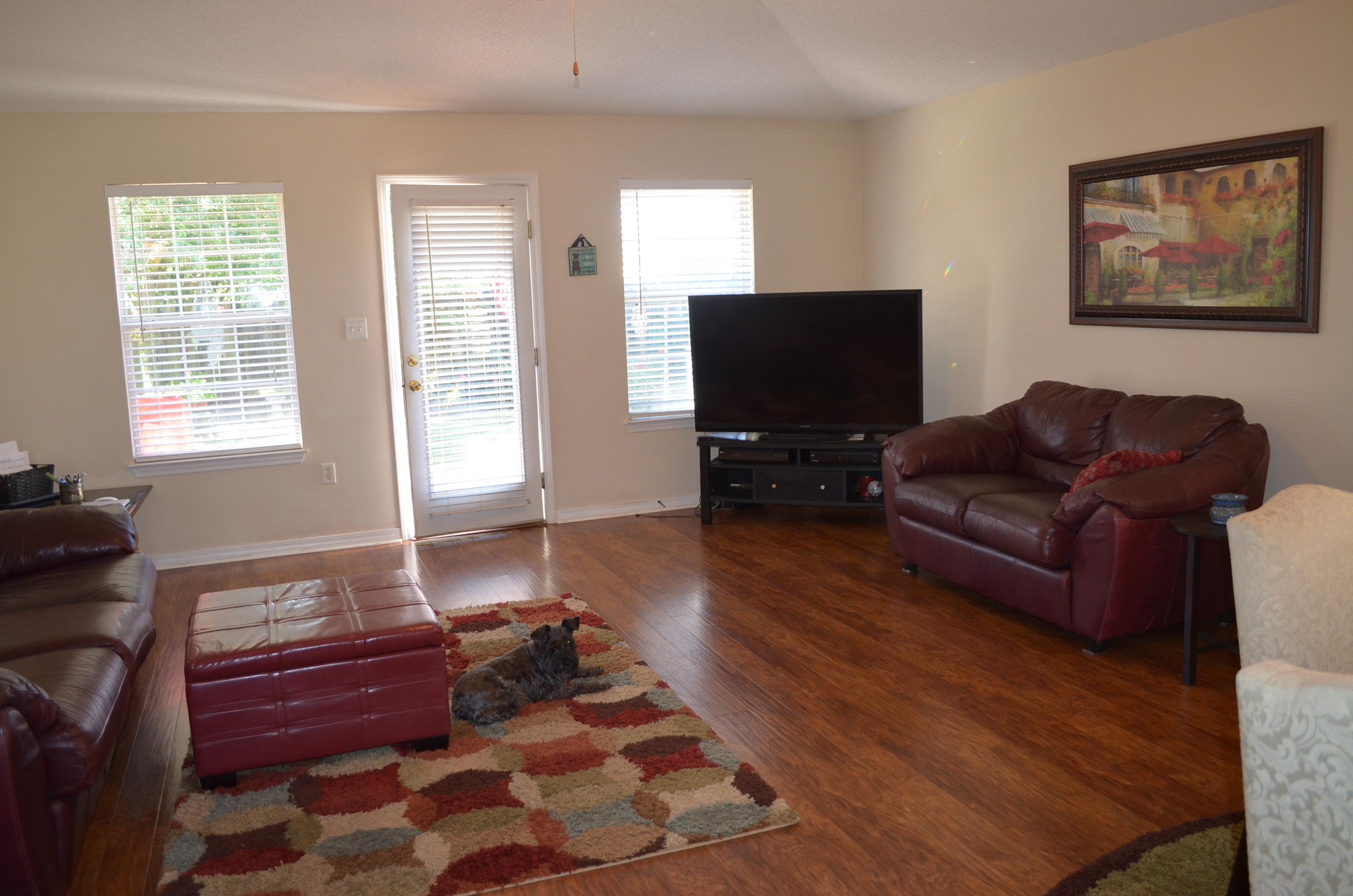 669 East Shipwreck Road Santa Rosa Beach, FL 32459 - Photo 24 of 35 a living room with furniture and a flat screen tv