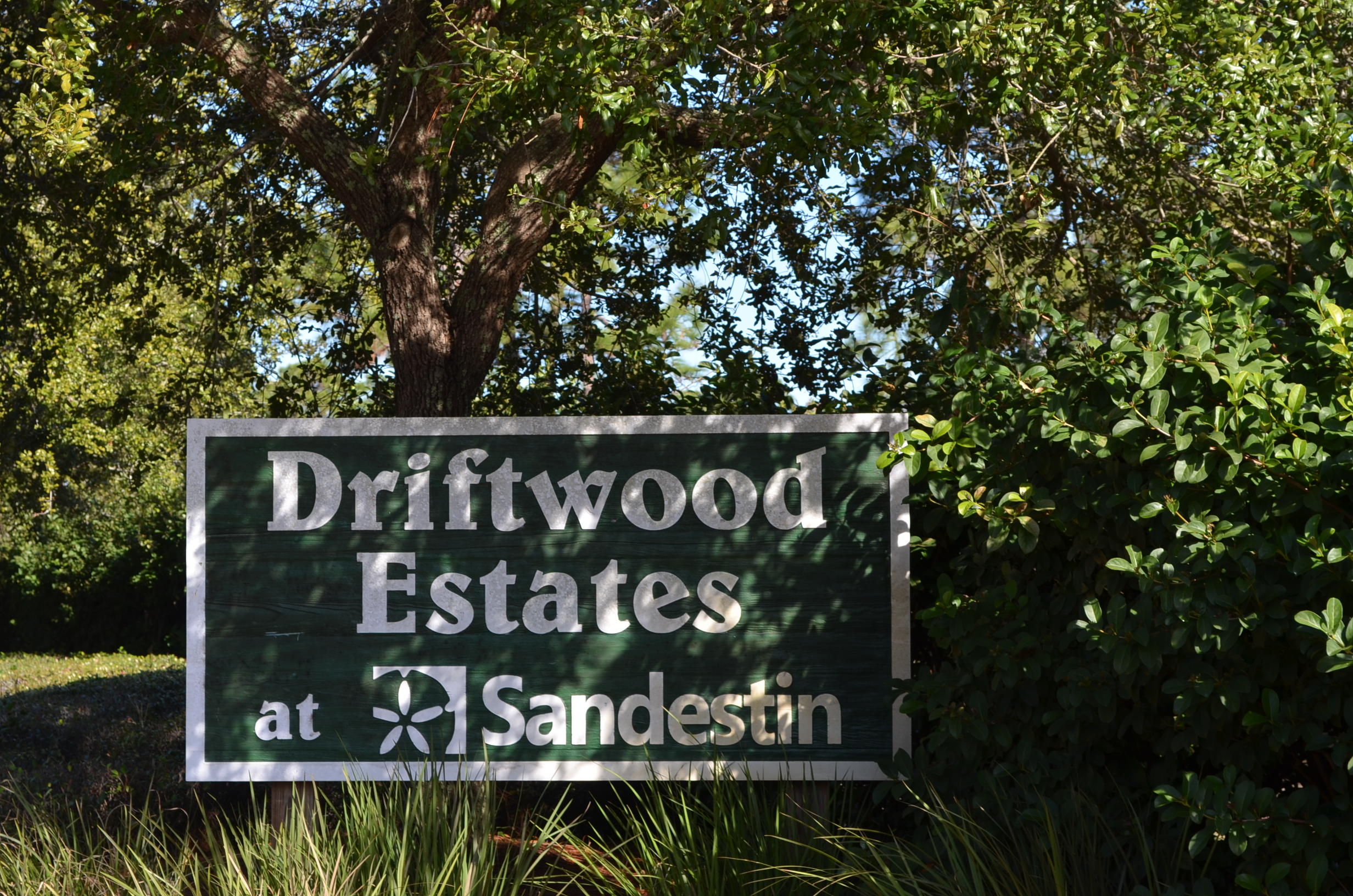 669 East Shipwreck Road Santa Rosa Beach, FL 32459 - Photo 29 of 35 a street sign that is on a wooden wall
