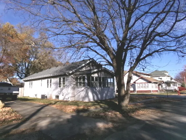 a view of a yard covered with snow
